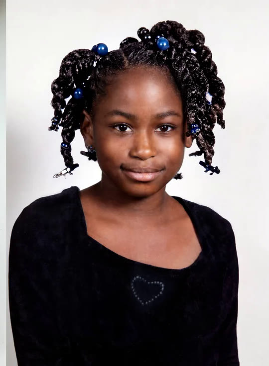 Restored young girl with braided hair